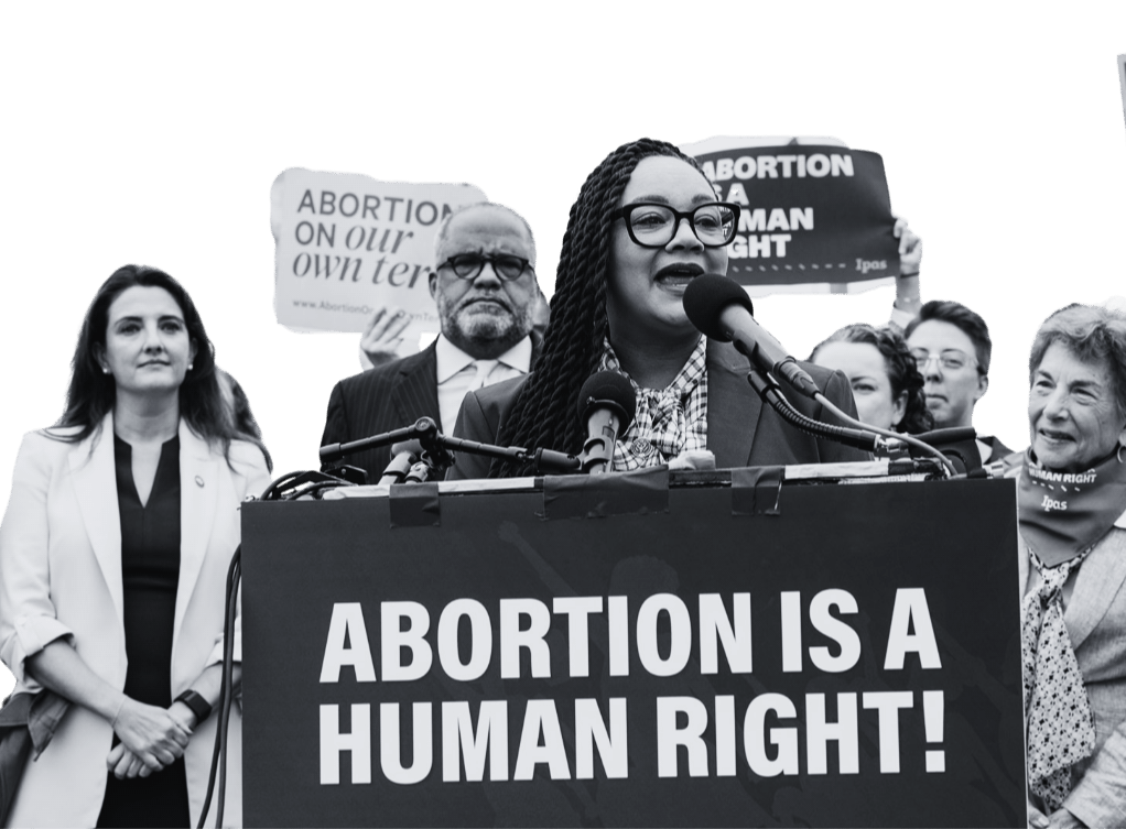 Woman speaking at an abortion rally