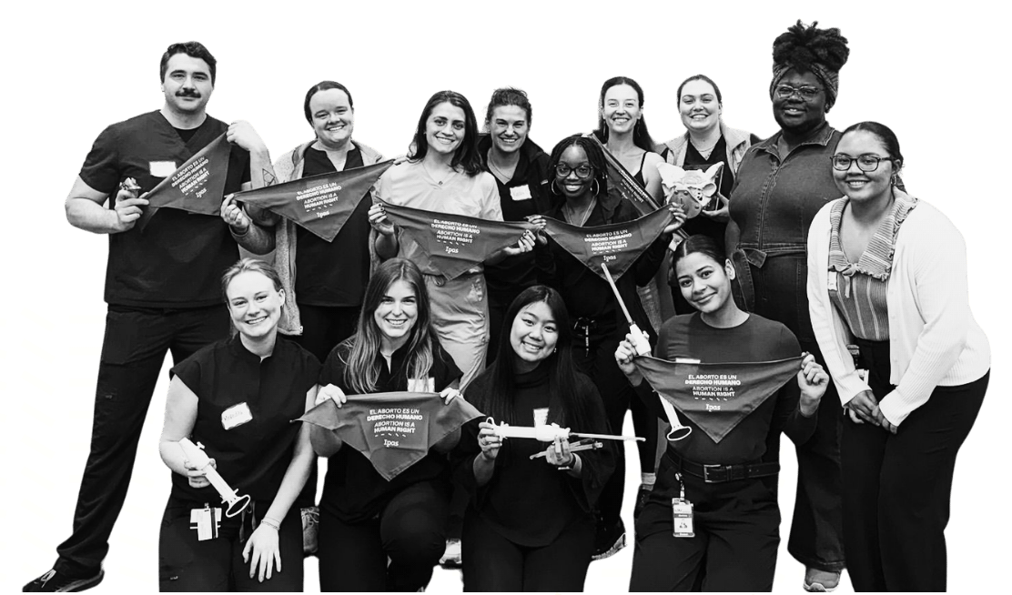 Group of men and women holding bandanas and implements